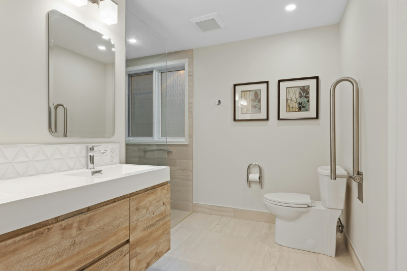 Extractor fan installed on a bathroom ceiling to improve ventilation and reduce excess moisture.